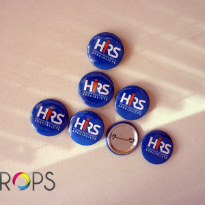 Designs of round buttons, advertising agency