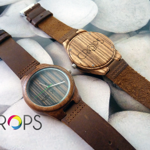 Wooden watch with engraved message, advertising agency